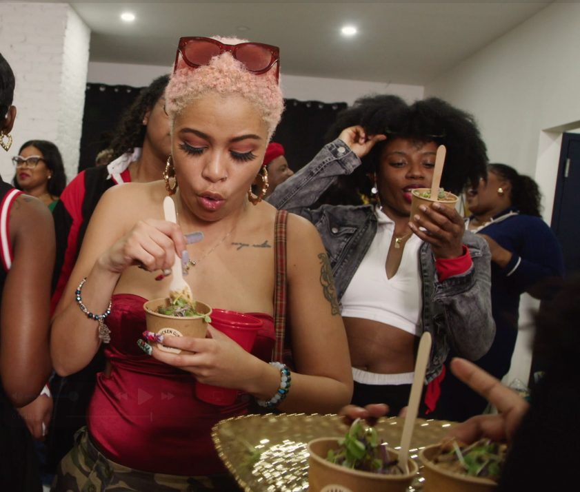 Diners sharing food at an EatOkra Okra & Beats Juneteenth celebration
